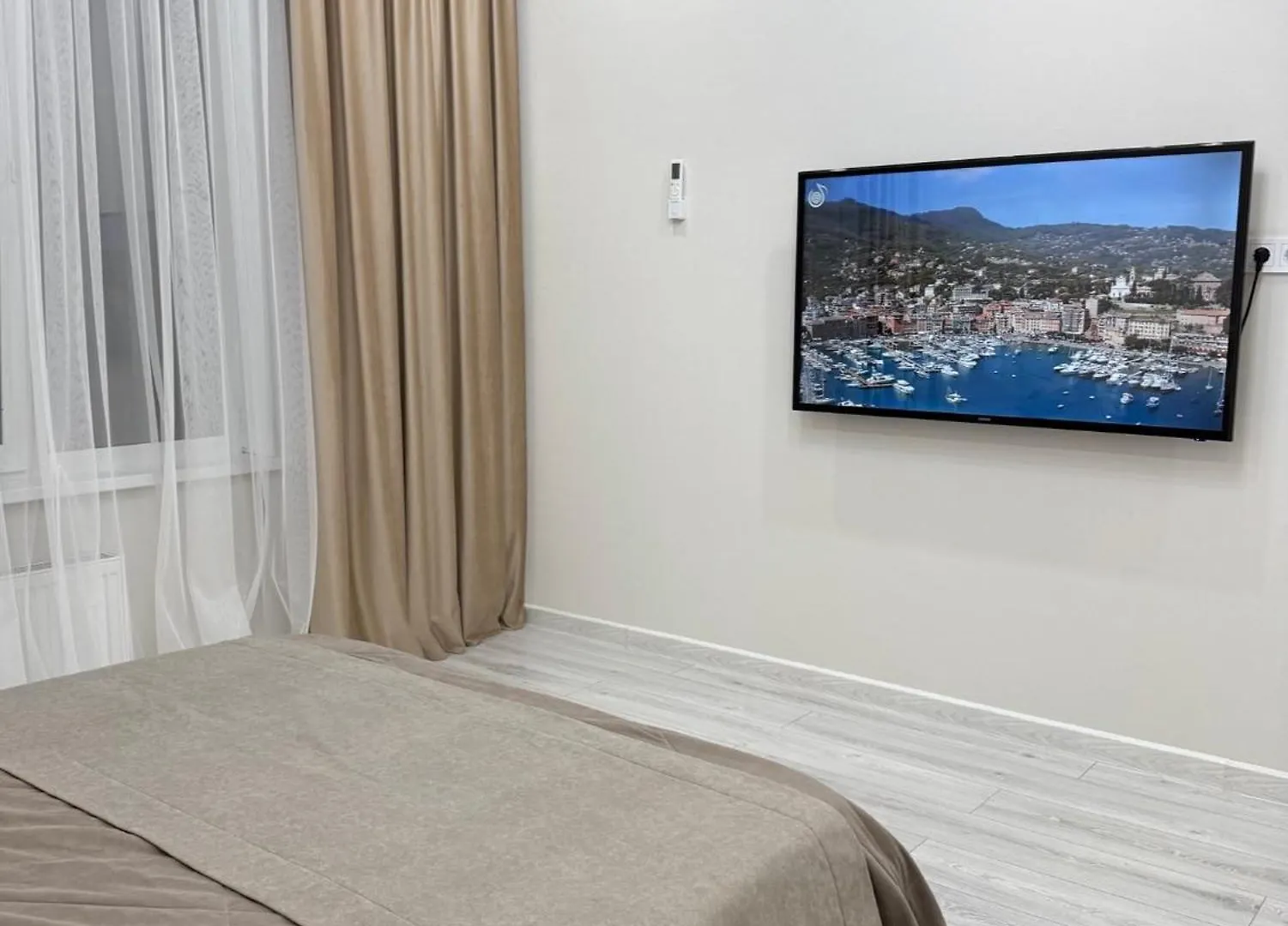 Уютнотут Astana Apartment